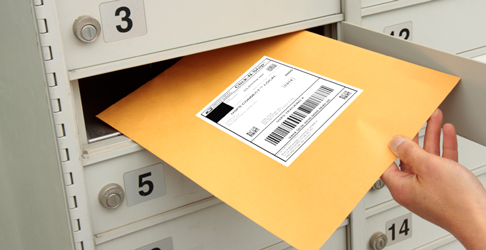 goldrushdispatch Connect Local Mail envelope being pulled out of a cluster unit box.