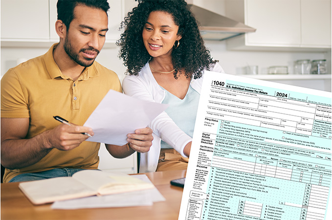 An IRS form 1040 and two people filling out tax forms together.